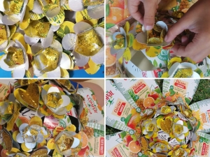 Montagem dos elementos finais: flores, corações e os símbolos da Tetra Pak.