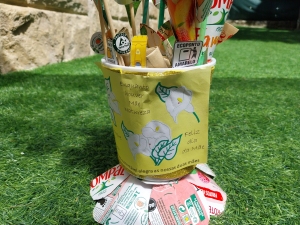 Símbolo da tetra pak no jarro da flor