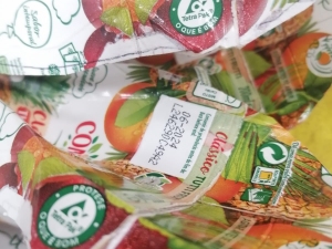 Embalagem Compal com símbolo Tetra Pak