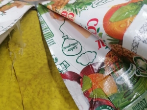 Embalagem Compal com símbolo Tetra Pak