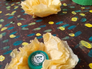 Tampa com o símbolo de TetraPack na flor